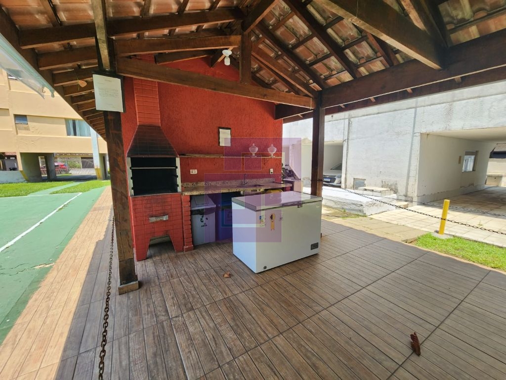 Apartamento à venda no Jardim dos Pássaros, Guarujá - 2 dormitórios, cozinha, garagem e mais!