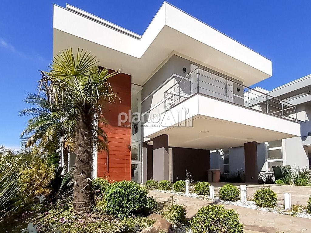 Venda de Casas / Padrão na cidade de Gravataí - foto 1