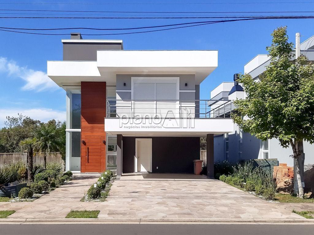 Venda de Casas / Padrão na cidade de Gravataí - foto 2