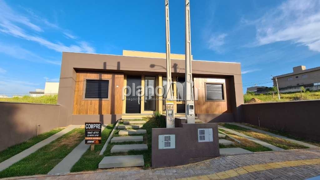Venda de Casas / Padrão na cidade de Gravataí - foto 1