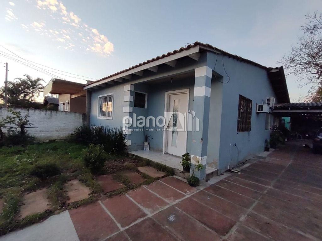 Venda de Casas / Padrão na cidade de Gravataí - foto 1