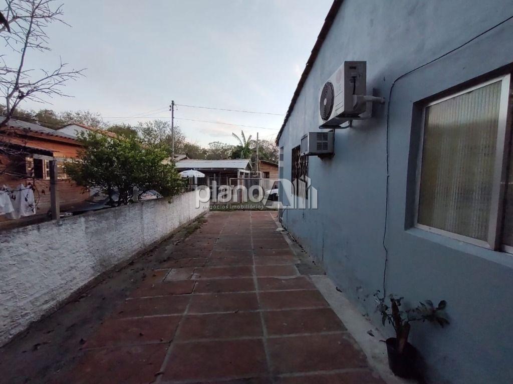 Venda de Casas / Padrão na cidade de Gravataí - foto 2