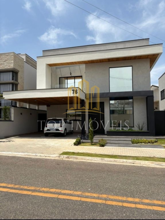 Maravilhosa casa quatro suítes em codominio fechado com laze