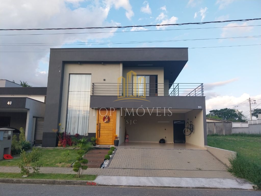 Casa assobradada com piscina no residencial ouroville em caç