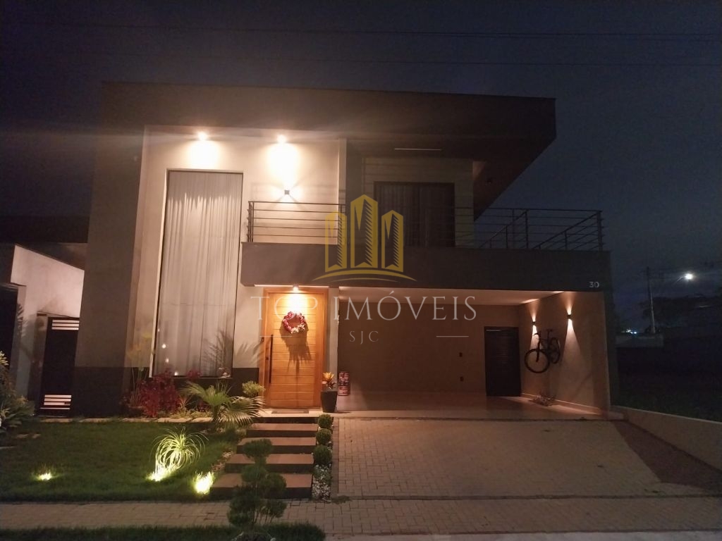 Casa assobradada com piscina no residencial ouroville em caç