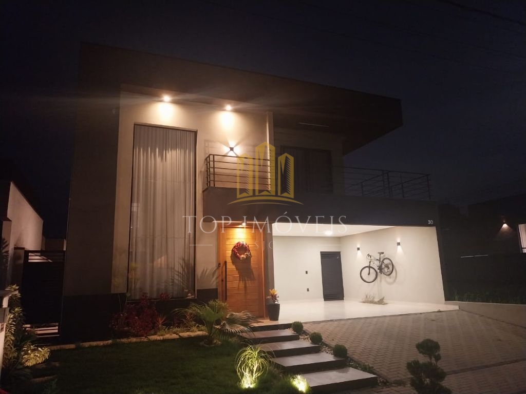 Casa assobradada com piscina no residencial ouroville em caç
