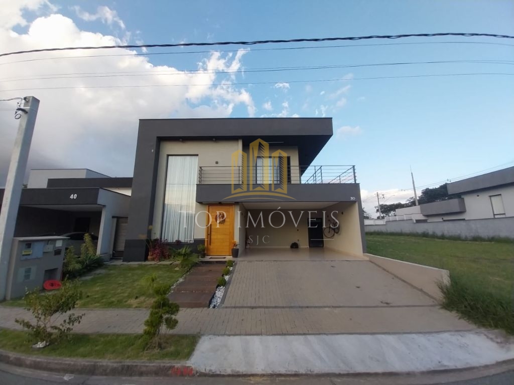 Casa assobradada com piscina no residencial ouroville em caç