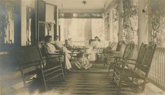 The Front Veranda in 1909 when the Flint family owned the house. The rocking chairs still exist!