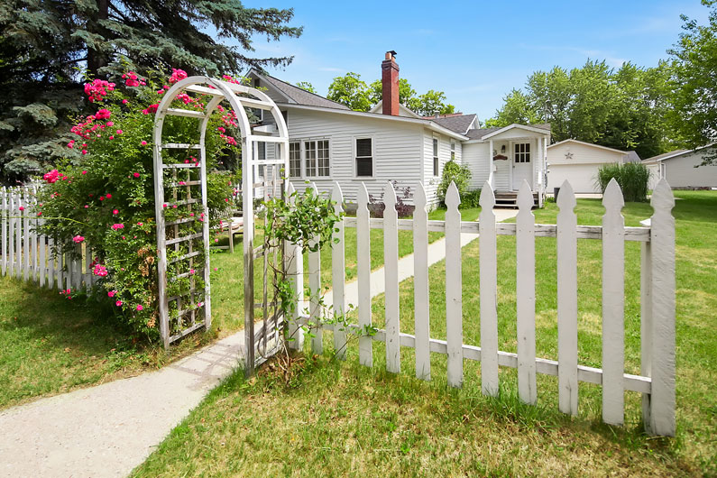 Welcome to Swan at Stonehearth - enter though the rose-covered arbor.