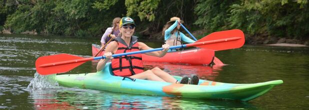 Paddling down the River