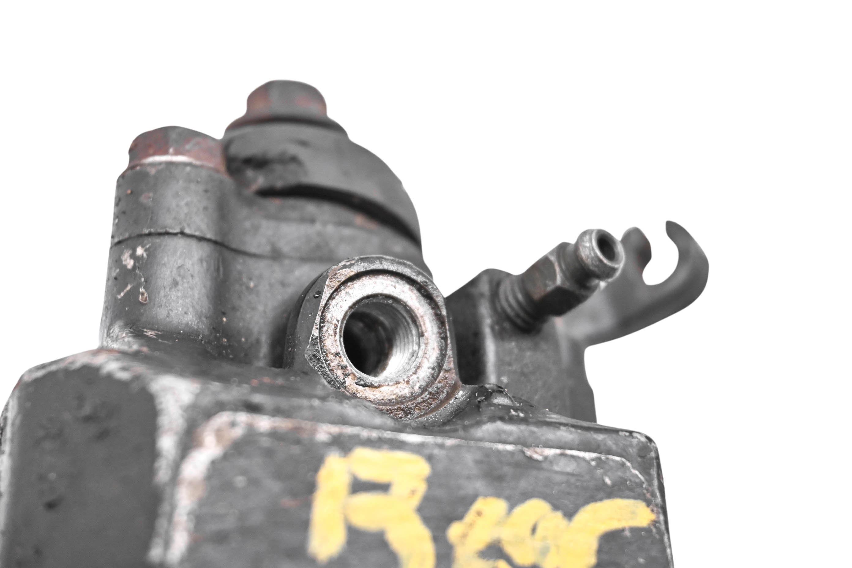 87 Honda TRX250X Rear Brake Caliper