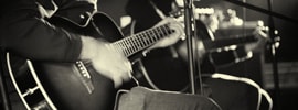 Two musicians collaborating but who pays to record