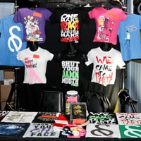 A merchandise table at a music event
