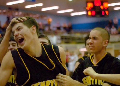 2005 Graduate Michael Graf being mobbed by teammates after making the game winning layup in the Regional Semi-Finals vs Orleans in 2005.