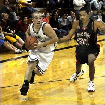 2009 Graduate and 3rd all team leading scorer and all time steals leader Cory Munk goes up for a shot vs Rock Creek in 2008.