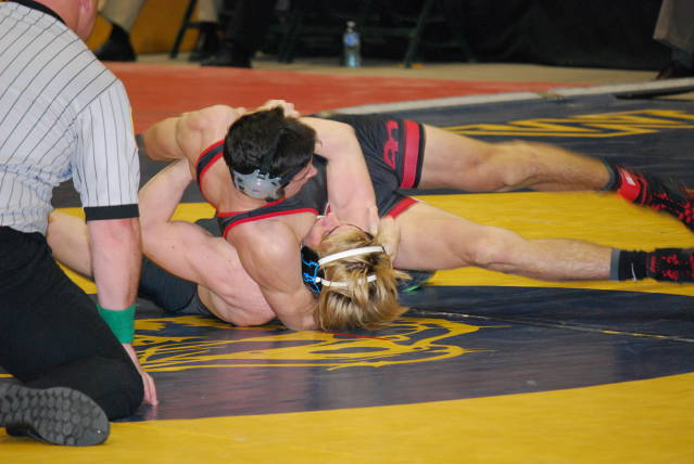 Bret Williams works a headlock on his opponent at the Maryland Sate Championships 