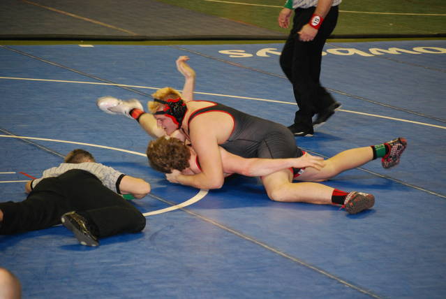 Connor Tilton positions for another pin on his way to his State Runner-up Finish.