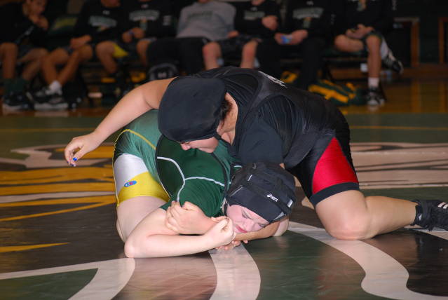 Senior Rebecca Murillo gets a two point takedown before pinning her Damascus opponent.
