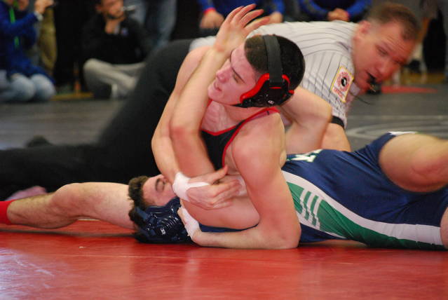 Senior Tony Wimmer wraps up his opponent