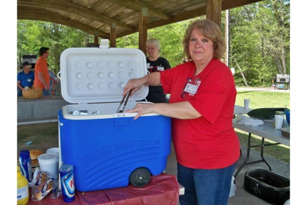 Martha McCall serving burgers!