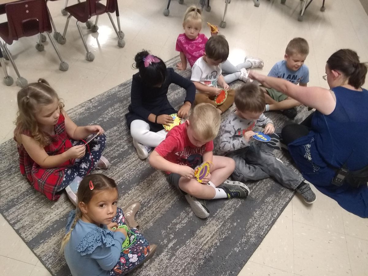 Miss Shirley is really good at teaching new skills to preschoolers! They enjoyed having her teach them how to sew with their alphabet sewing cards.