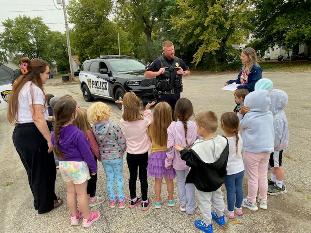 Children learned about a police officer's uniform