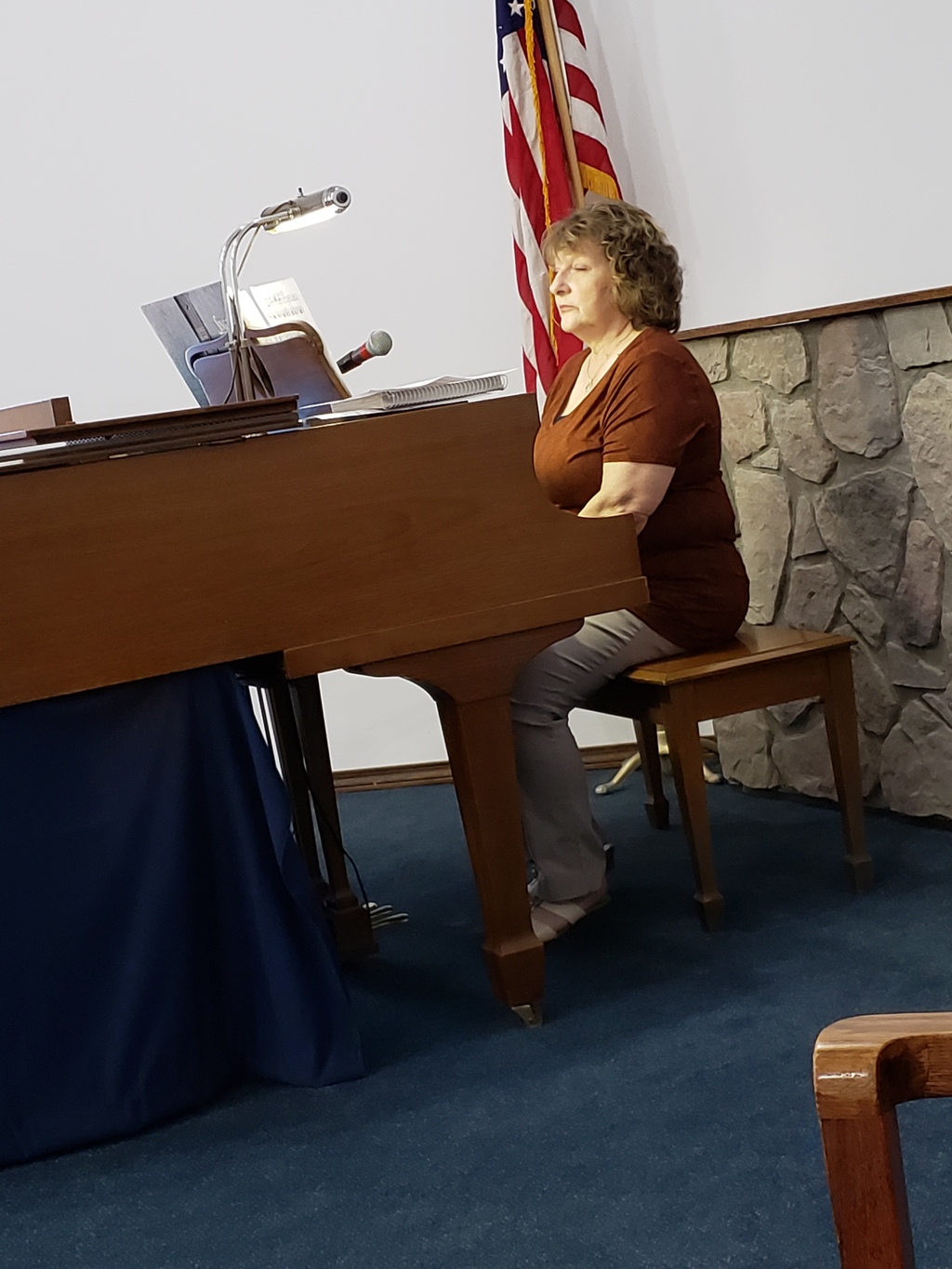 Joyce is playing the piano for service