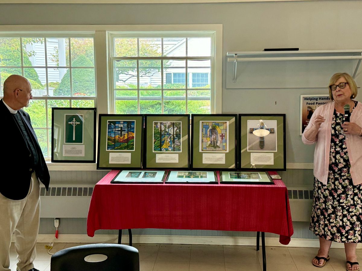 Jean explains the framed memorial photos