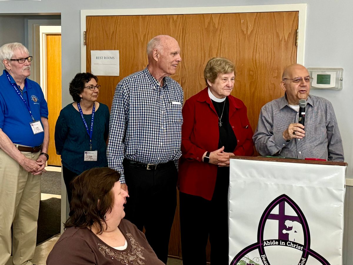 Mtr. Sally and St. Boniface leaders give thanks for the work of Fr. Tom and Mtr. Elizabeth