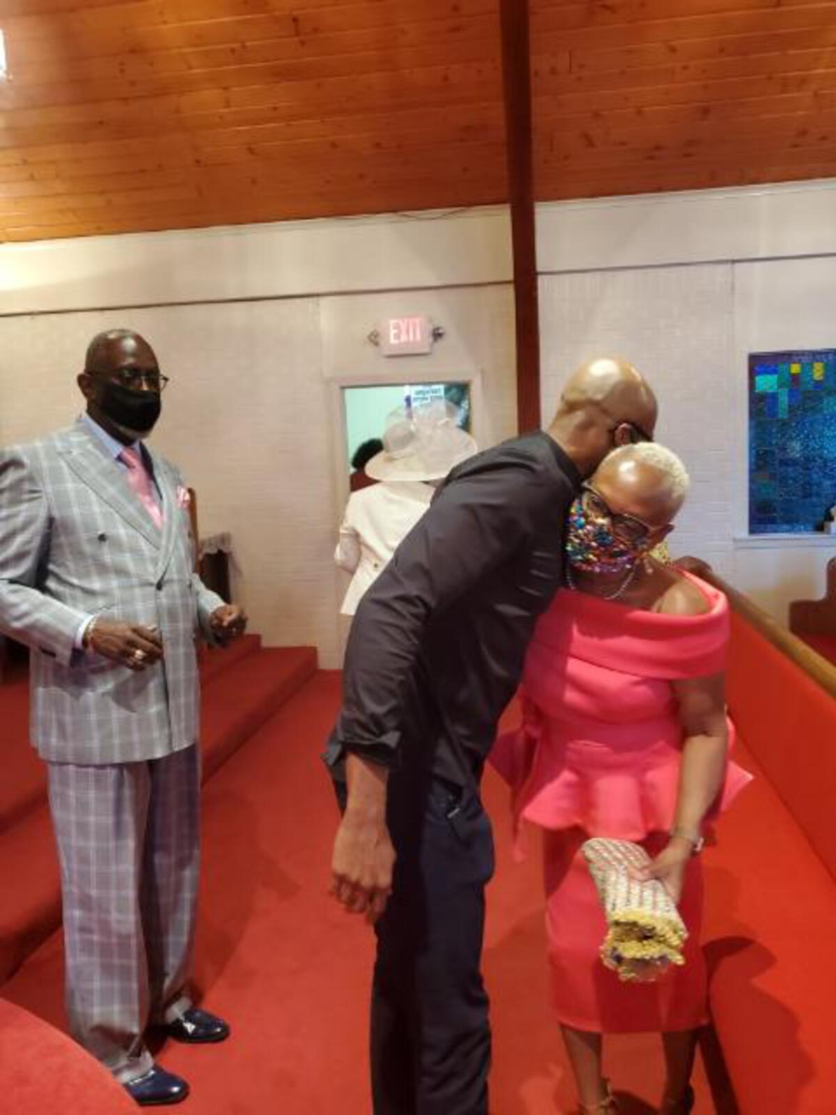 Clarence Talley, Jr & Pastor Bettye Tompkins sharing some love