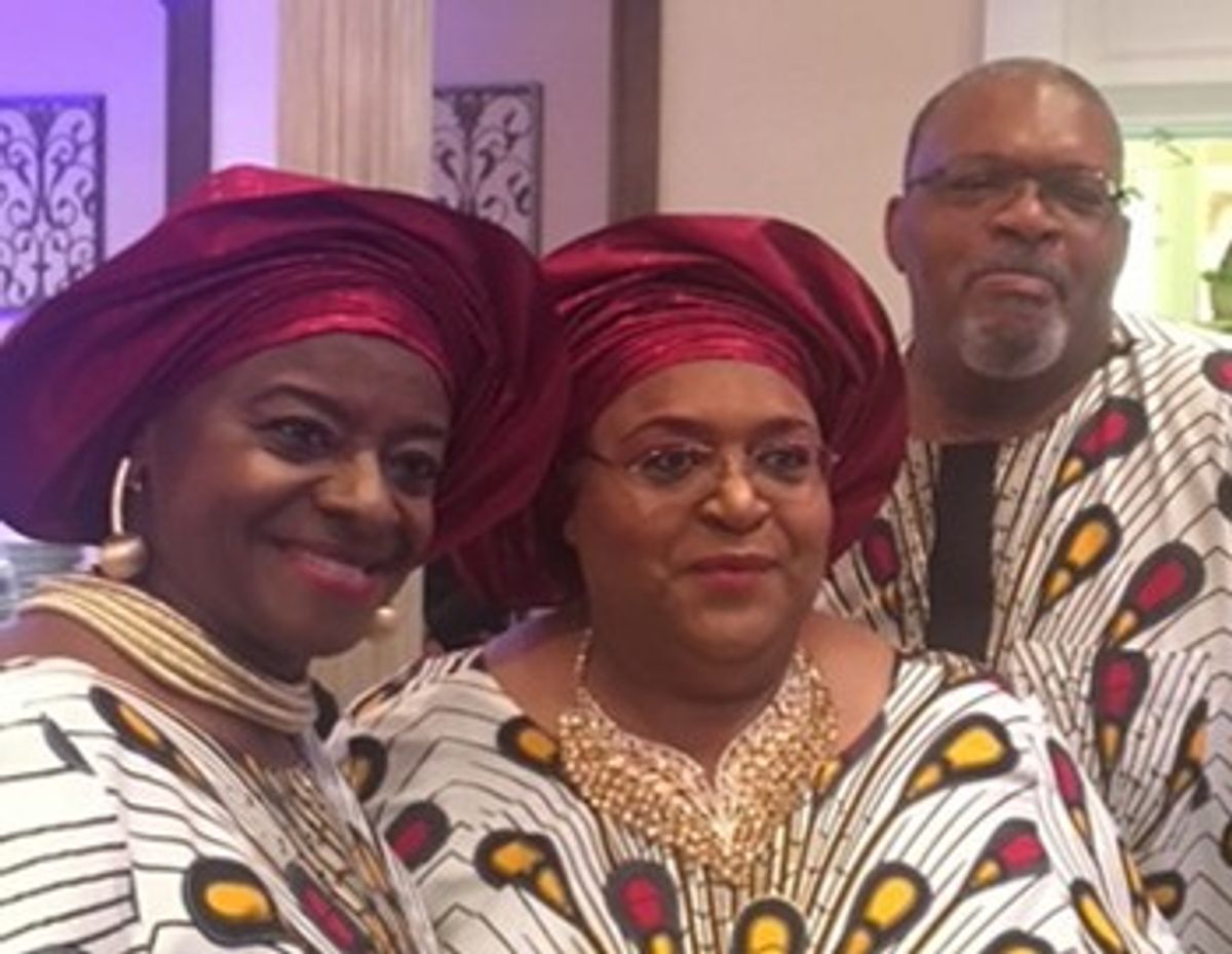 Kim and her family at an African wedding.