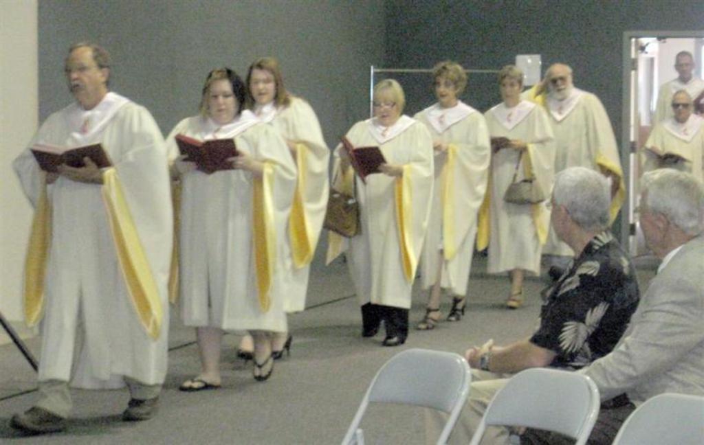 Choir singing Us In To Temporary Sanctuary in CFLC
