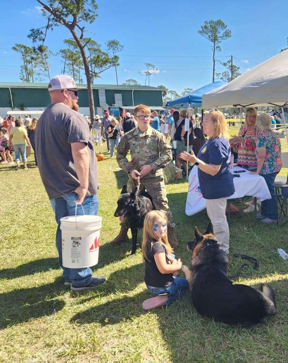 Hearts & Hands Booth, Tommey & Tonka the Therapy Dog welcomed many people