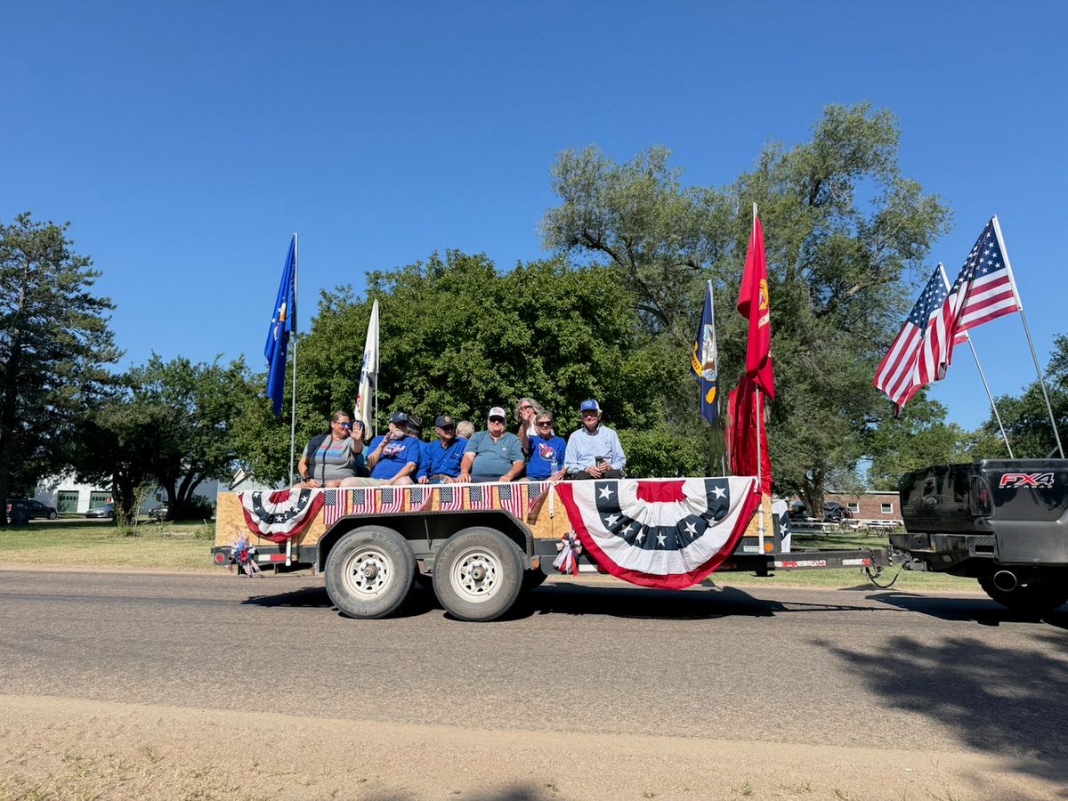 Parade Entry: Hometown Heros. Float honoring Veterans. Veterans on board include Dan R, Gary P, Hallie W, Roger S, Don C, Paul M, Alan C, Nancy O, Tama M & Ed, Roland W, & Mitch V (who was riding on another float)