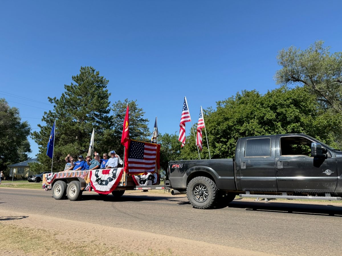 Parade Entry: Hometown Heros. Float honoring Veterans. Veterans on board include Dan R, Gary P, Hallie W, Roger S, Don C, Paul M, Alan C, Nancy O, Tama M & Ed, Roland W, & Mitch V (who was riding on another float) Being pulled by Dakota R