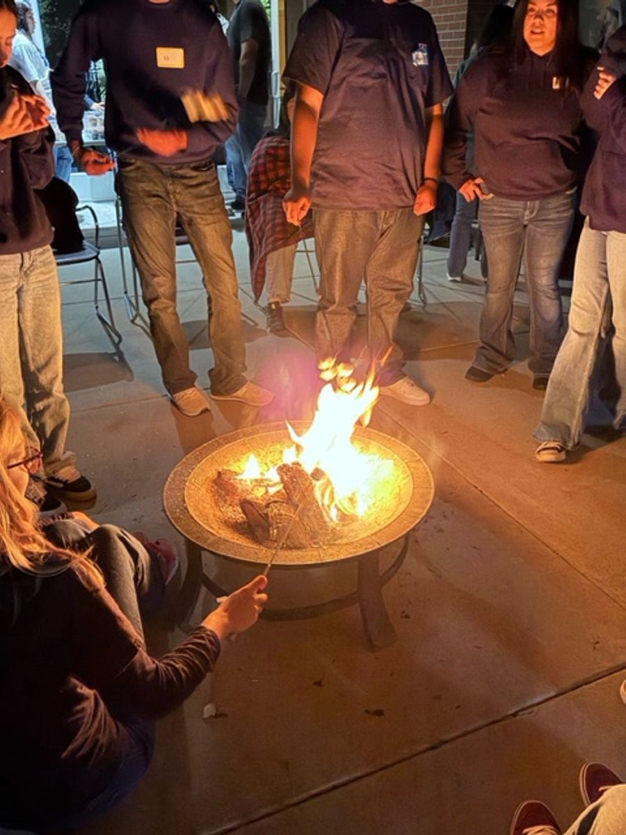 Roasting s’mores. (Is that the Holy Spirit burning in the middle of this photo?)