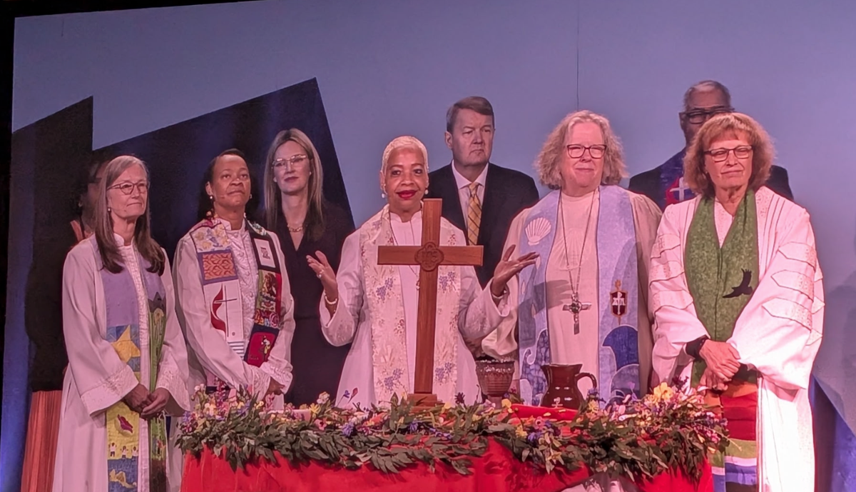 UMC Bishops and Agency heads prepared to serve communion.