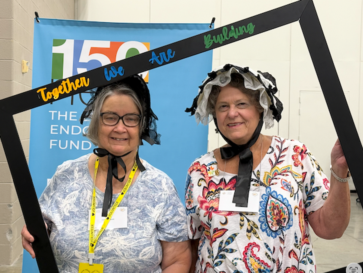Pam Zwickey and Linda Elms (now in Texas Conf) in historical hats