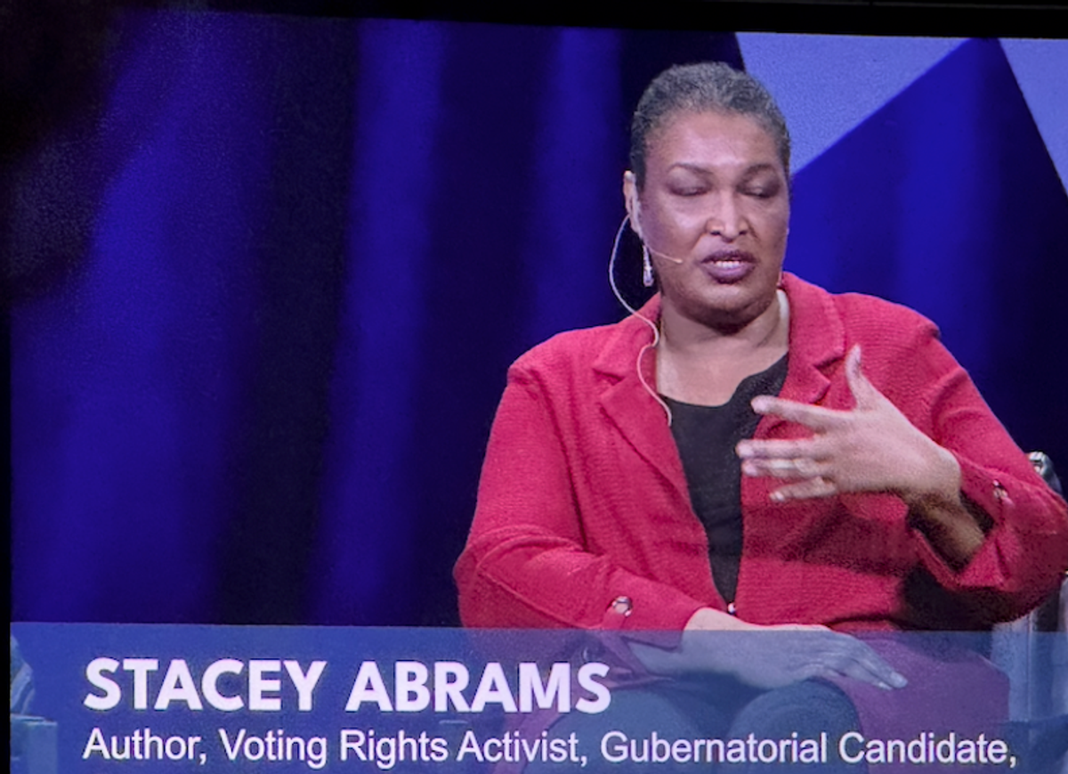 Stacey Abrams stressed the importance of standing up for what is right, such as voting rights, and public education for all.