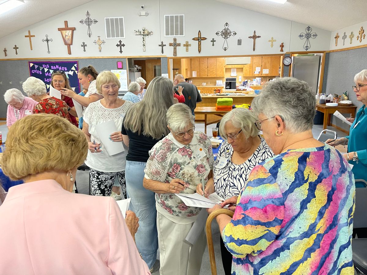 Participating in the Human Bingo game.