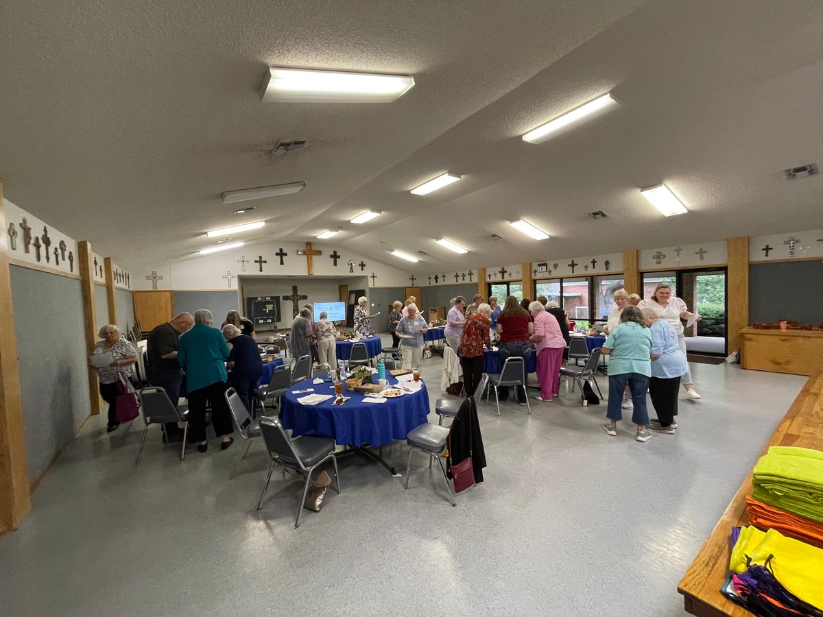 Participating in Human Bingo, an interactive icebreaker game that helps people get to know each other by using bingo cards filled with personal characteristics and facts.