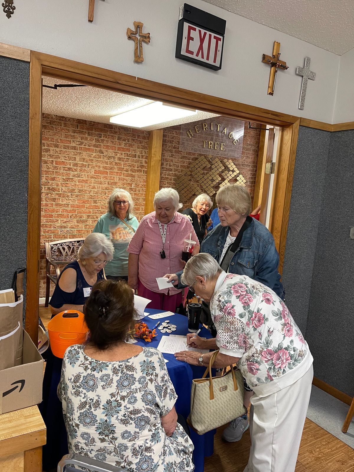 Check-in at the registration table.