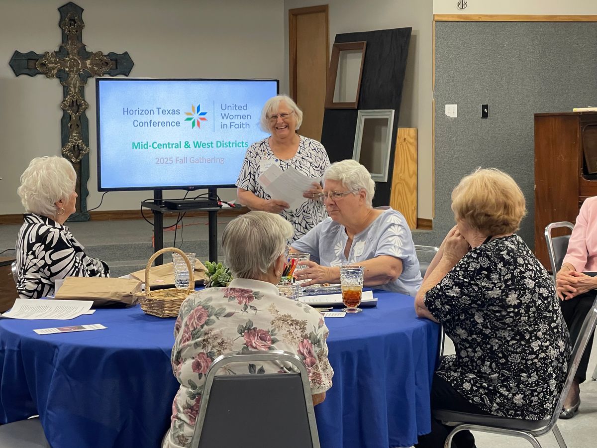 Christie Roberts, UWFaith MC District President & UWFaith MCW District Unit President, welcomes everyone to the gathering