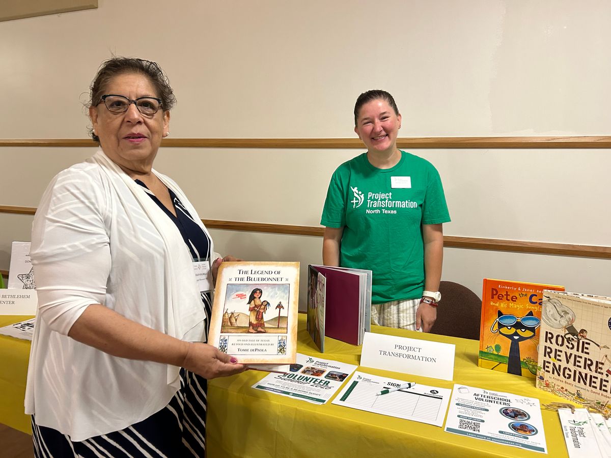 Helen Escamilla, Agape Memorial UMC, is visiting with Andrea Gordon, Director of Programming and Leadership Development, Project Transformation North Texas.