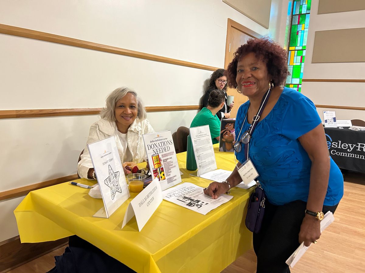 Annette Cullors (seated), Program Manager of the Dallas Bethlehem Center and Regina Proctor, St. Luke