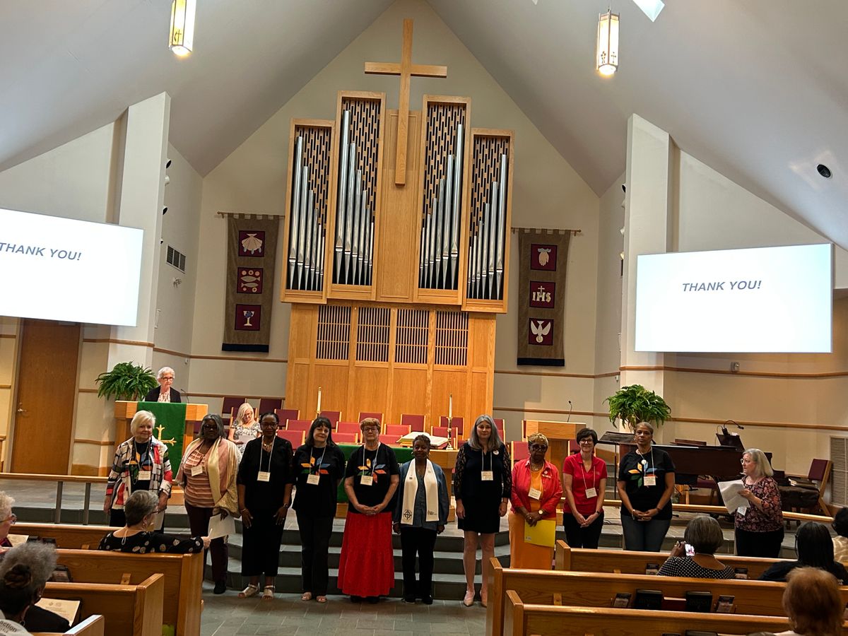 Linda McAlister (far right) of the Nomination Committee, presented the 2026 officers.