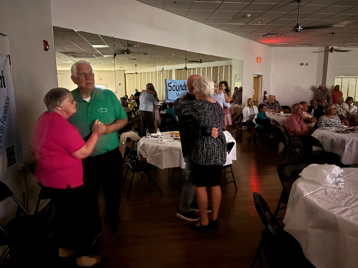 Jackie and Mark and friends dancing to the Collaboration Band
