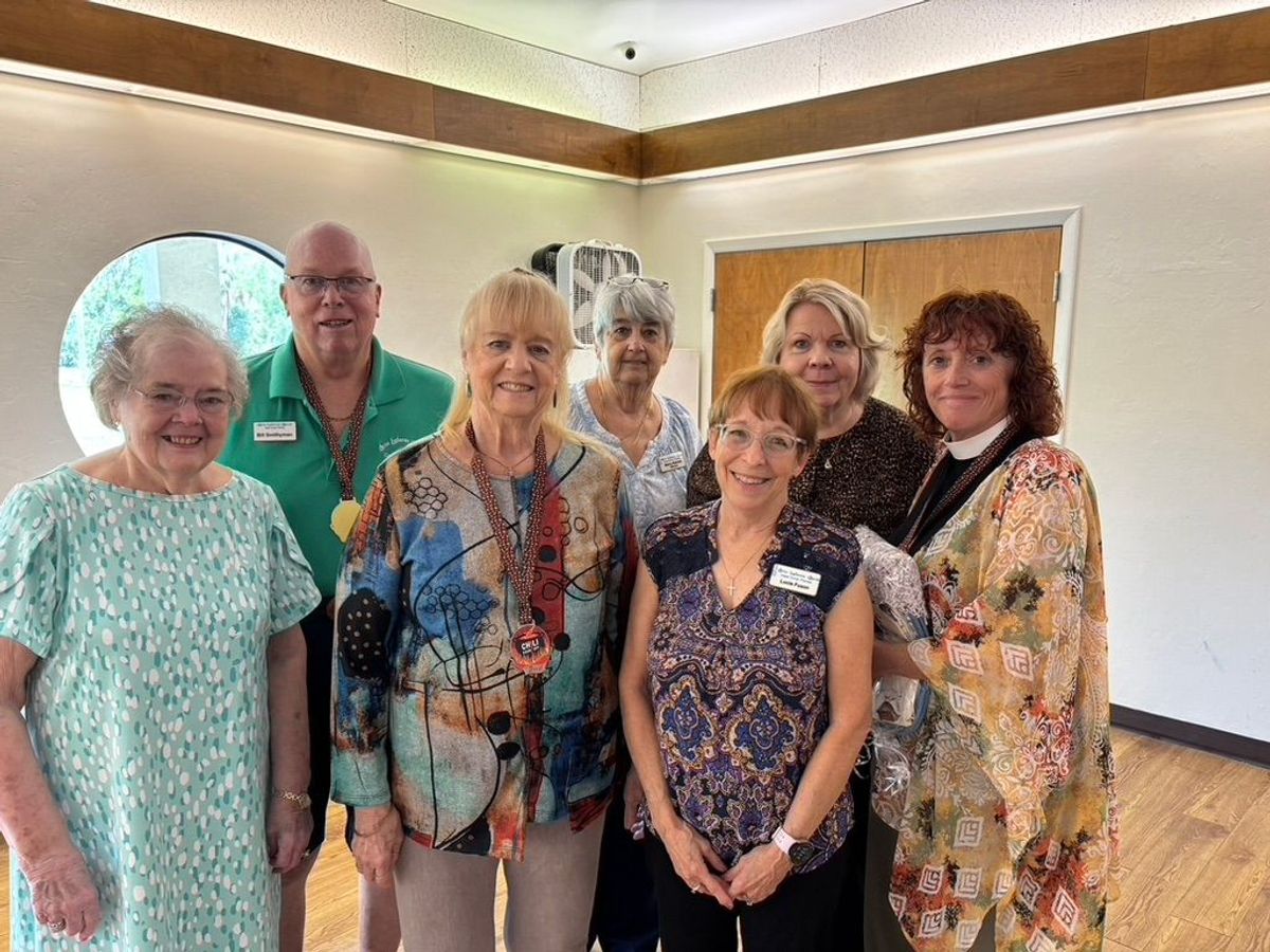 Chili cook off winners along with the planning committee