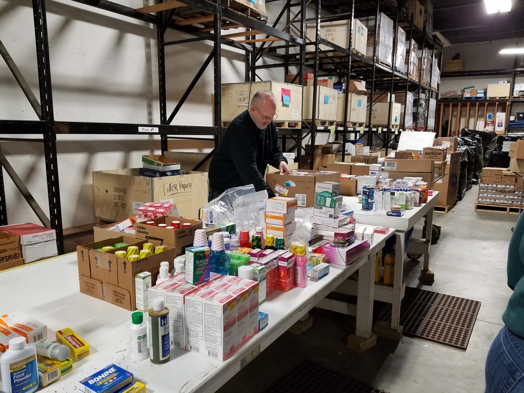 Dr. Mike - Sorting medical supplies