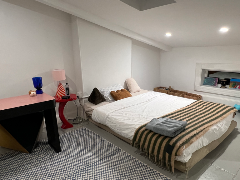 Bedroom, Japanese design, serene and minimalist, clean lines, natural materials, wood, stone, neutral colour palette, sliding doors shoji, tatami mats,  Zen garden elements, focus on simplicity and harmony